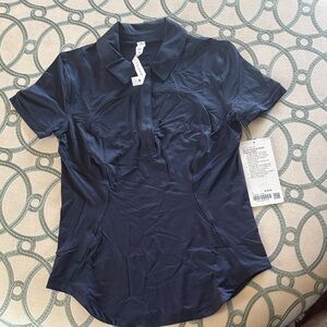 Lululemon Athletica quick drying short sleeve polo